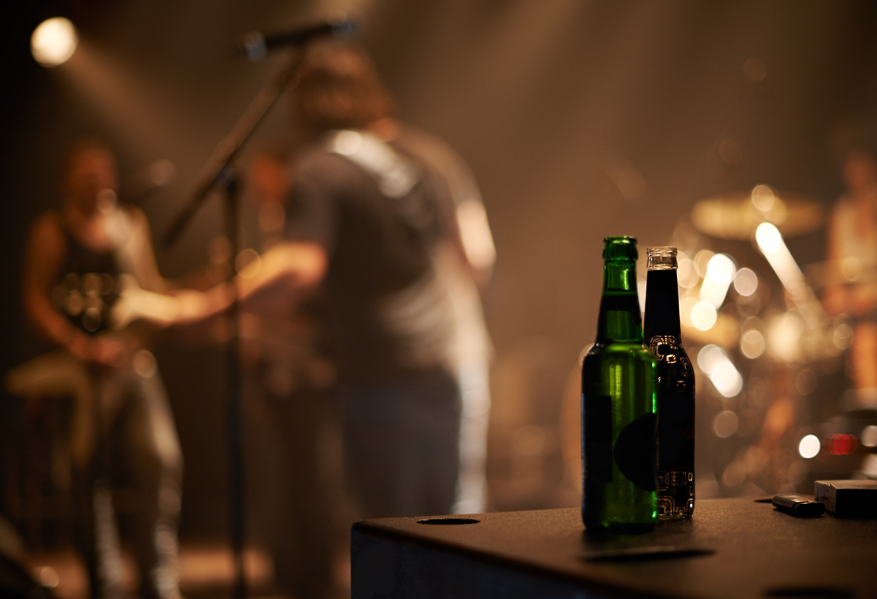 lets-have-another-two-beer-bottles-table-as-band-plays-background.jpg