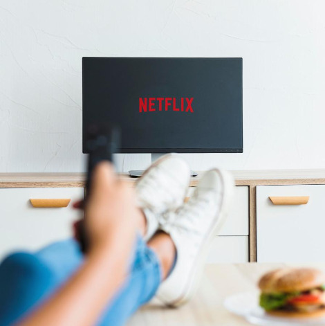 crop-female-watching-netflix-series-living-room.jpg