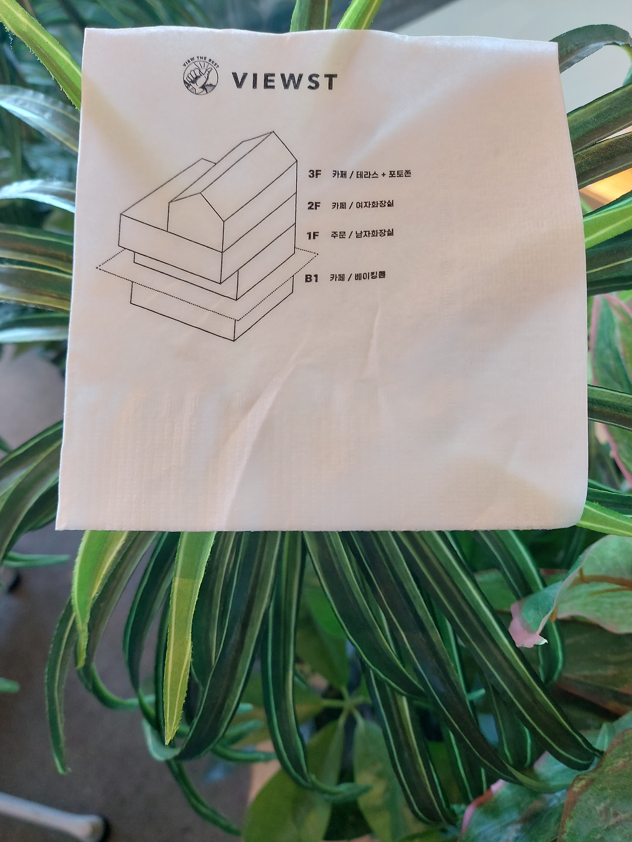 사계 해변 뷰스트 카페 냅킨에 인쇄된 건물 구조도.jpg
