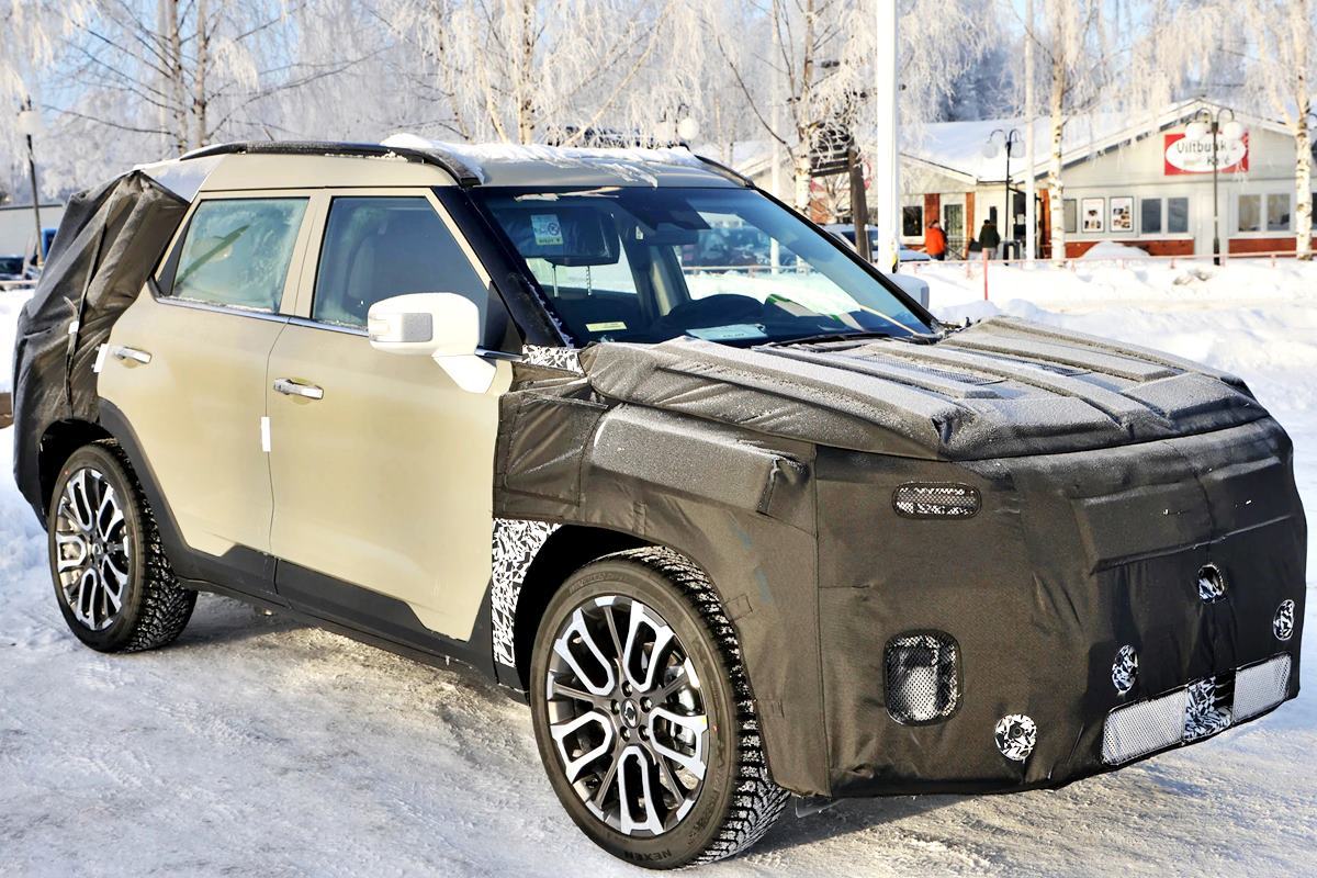 쌍용자동차 토레스 EV 위장막 모델 Motor1.jpg