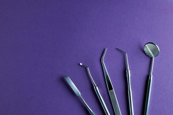 dentist-tools-professional-steel-dental-instruments-with-background-with-free-space-photo.jpg
