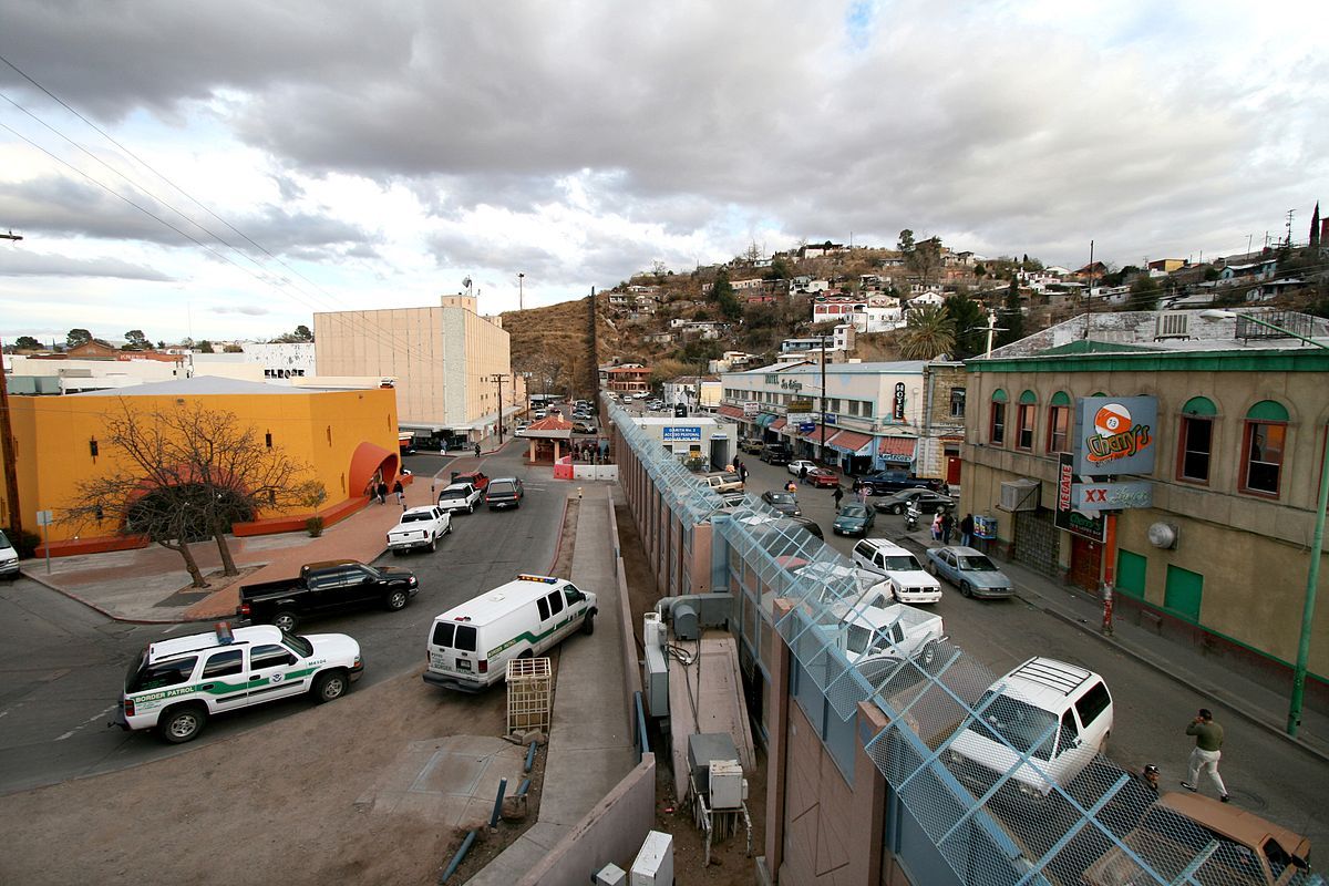 1200px-Mexican-American_border_at_Nogales.jpg