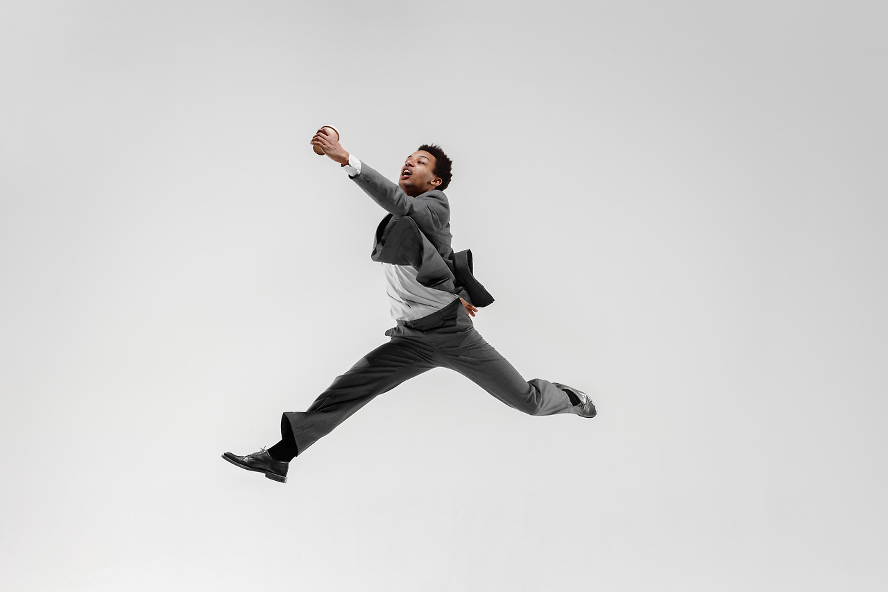 happy-businessman-dancing-motion-isolated-white-studio-background-flexibility-grace-business-human-emotions-concept-office-success-professional-happiness-expression-concepts.jpg