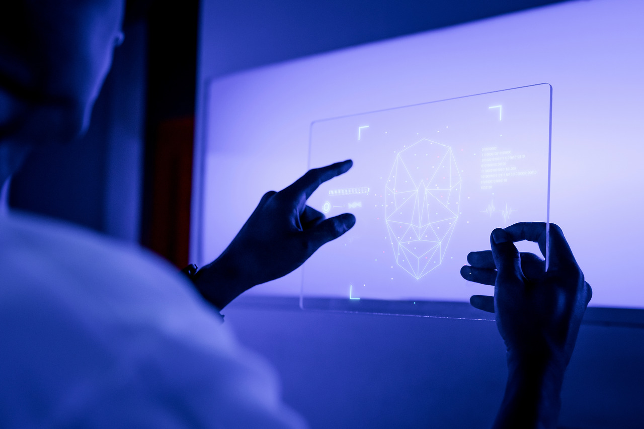 designer-using-transparent-digital-tablet-screen-futuristic-technology.jpg