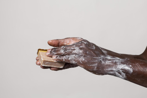 african-person-washing-hands-with-soap-isolated-white.jpg
