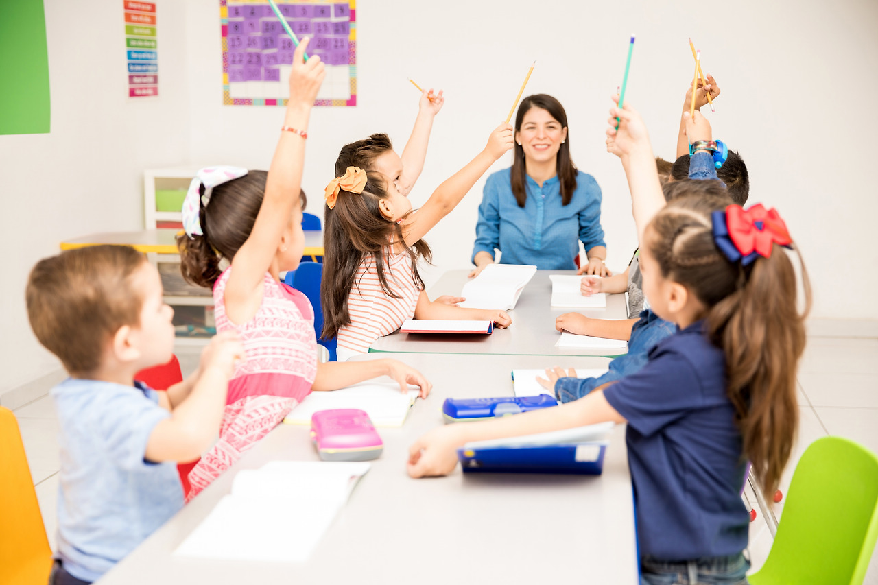 group-preschool-students-raising-their-hands-during-class-trying-participate.jpg