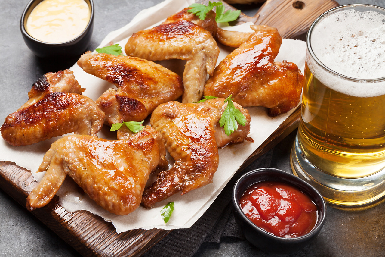 hot-chicken-wings-and-draft-beer-2021-08-26-15-50-11-utc.jpg