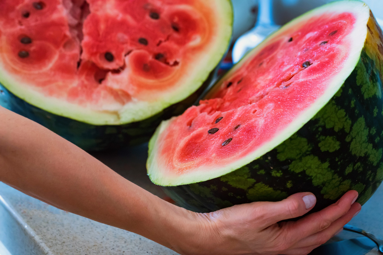 ripe-juicy-watermelon-cut-in-halves-close-2023-11-27-05-23-26-utc.jpg