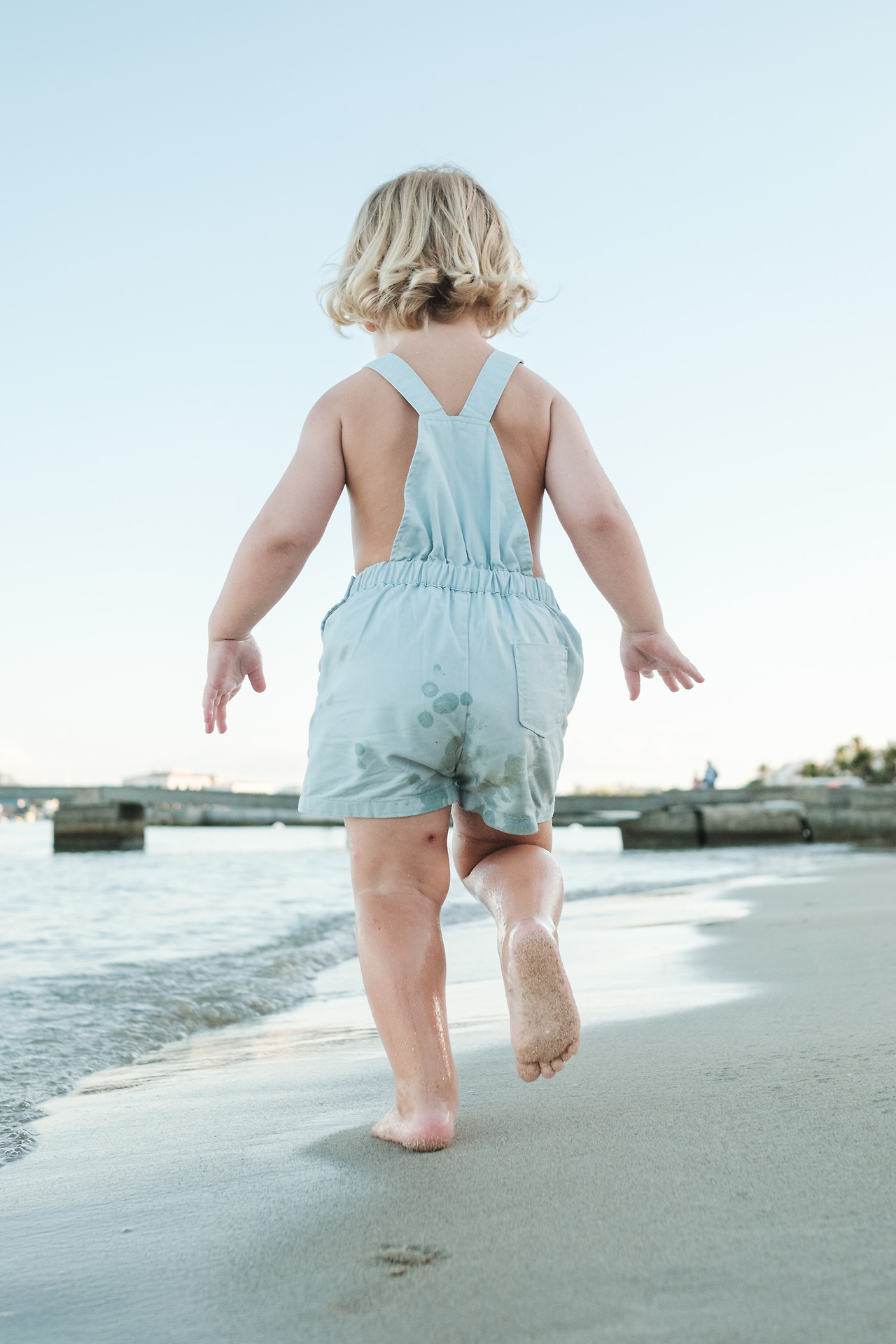 little-barefoot-toddler-in-summer-suit-walking-on-2023-08-15-20-36-31-utc.jpg