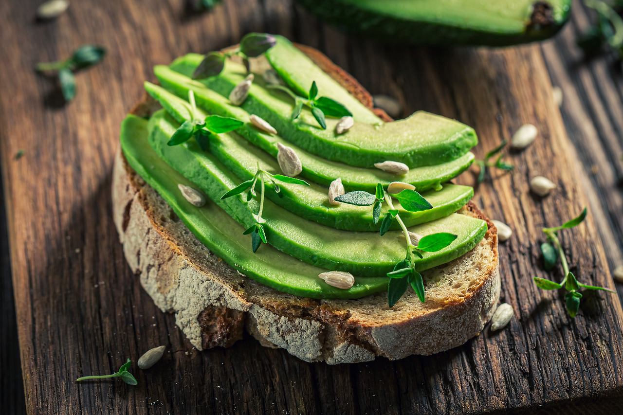 closeup-of-sandwich-with-avocado-and-sunflower-see-2022-03-31-18-29-37-utc.jpg