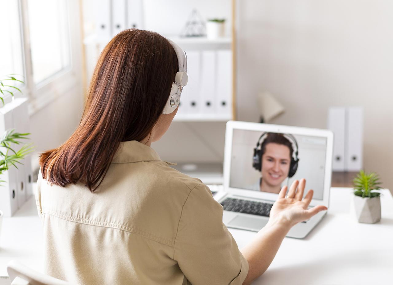 woman-work-having-video-call-laptop.jpg