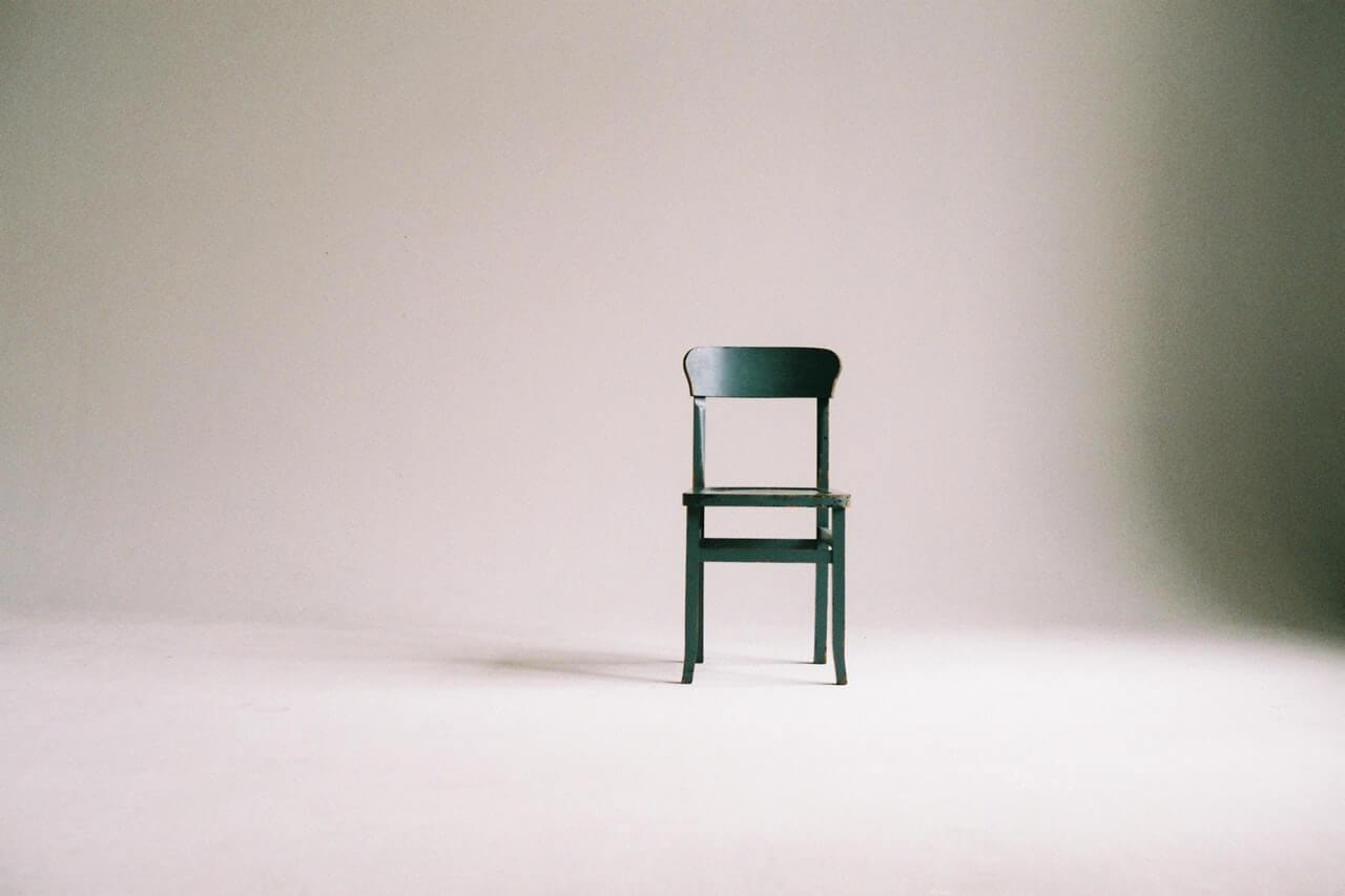 green-wooden-chair-on-white-surface-963486.jpg