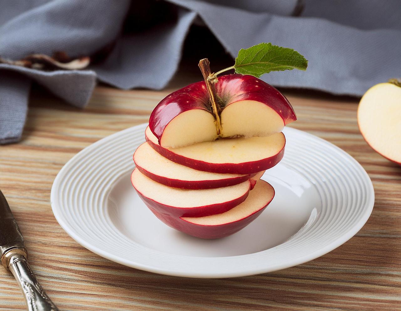 Firefly cut apple on the white dish 98621.jpg