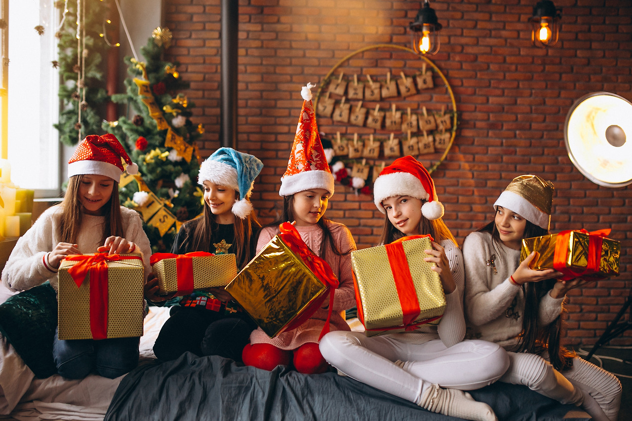 group-kids-sitting-sitting-with-presents.jpg