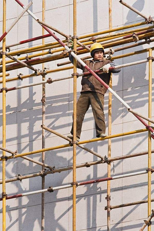 chinese-worker-scaffold-weihai-china-dec-dec-china%C3%A2%E2%82%AC%E2%84%A2s-million-migrant-workers-travel-rural-areas-to-big-91702641.jpg