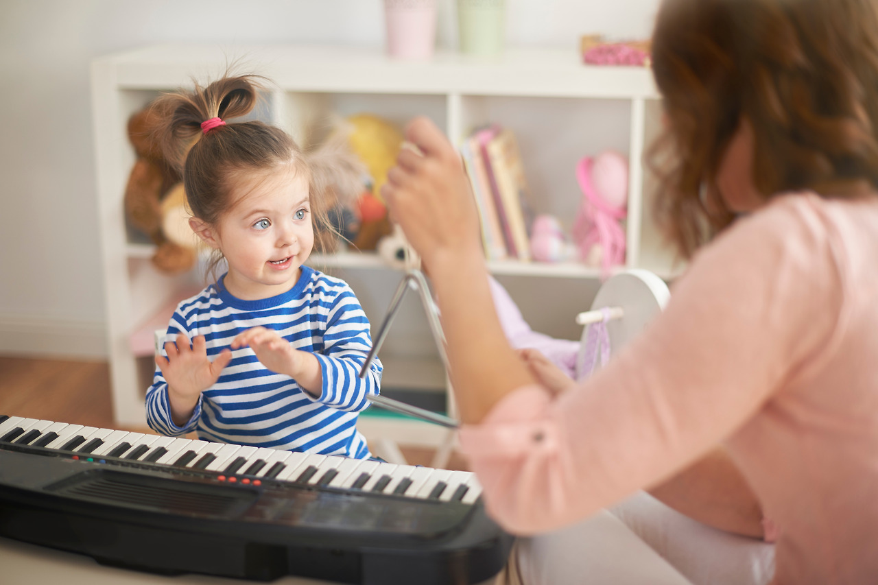little-girl-learning-play-piano.jpg