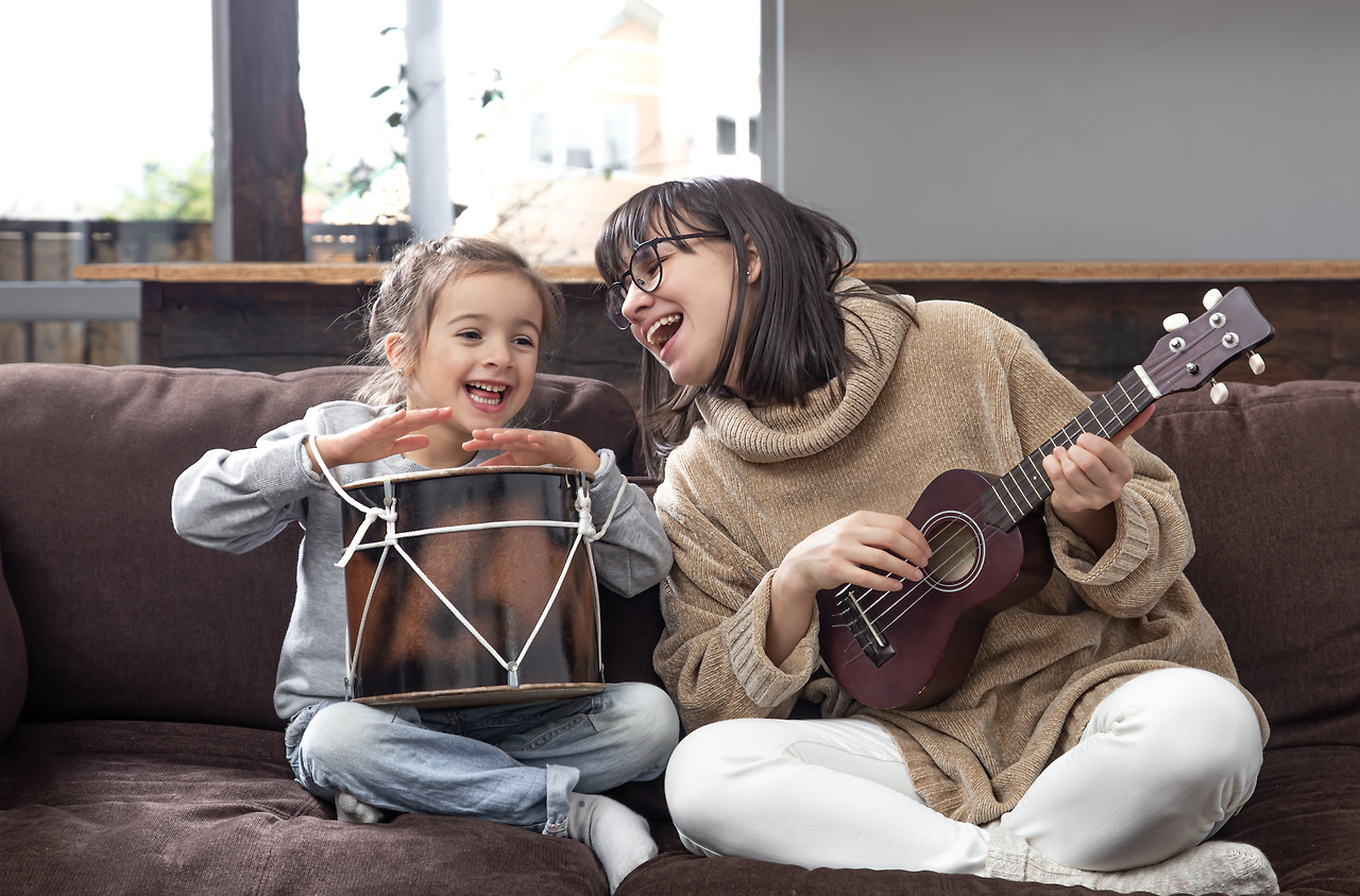 mom-plays-with-her-daughter-home-lessons-musical-instrument-children-s-development-family-values-concept-children-s-friendship-family.jpg