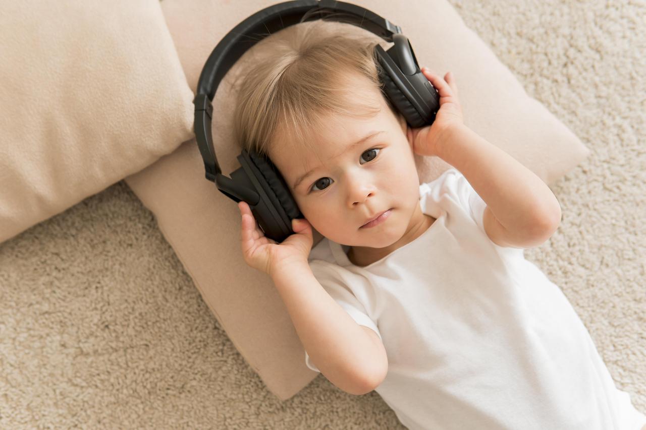 top-view-cute-baby-wearing-headphones.jpg