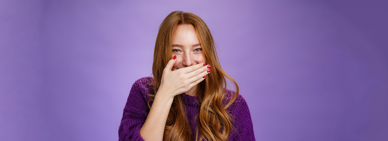 vecteezy_close-up-shot-of-girl-having-fun-giggling-covering-mouth_49921784.jpg