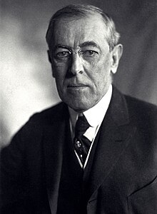 220px-Thomas_Woodrow_Wilson%2C_Harris_%26_Ewing_bw_photo_portrait%2C_1919_-_black_and_white_%28cropped%29.jpg