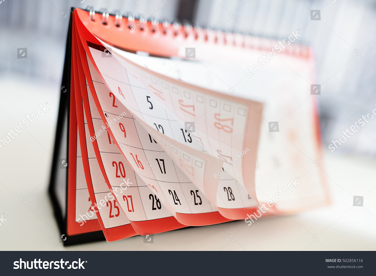 stock-photo-months-and-dates-shown-on-a-calendar-whilst-turning-the-pages-502856116.jpg