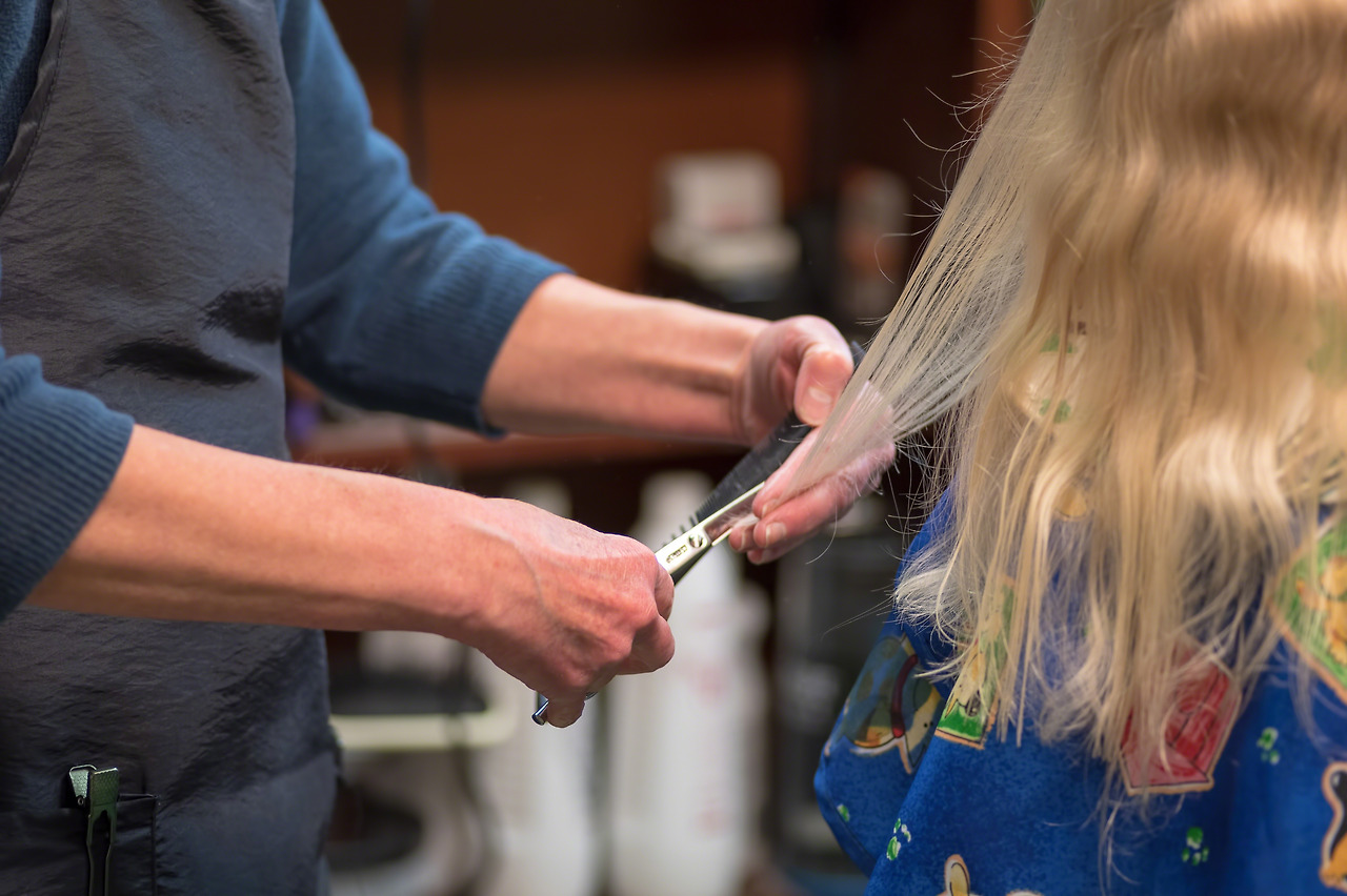 little-girl-getting-her-hair-cut-2023-11-27-05-10-28-utc.jpg