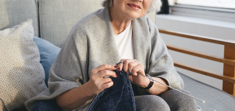 picture-neat-retired-woman-wearing-wide-scarf-eyeglasses-knitting-warm-jumper-her-daughter-attractive-senior-female-knitter-working-from-home-handmaking-winter-clothes-sale.jpg