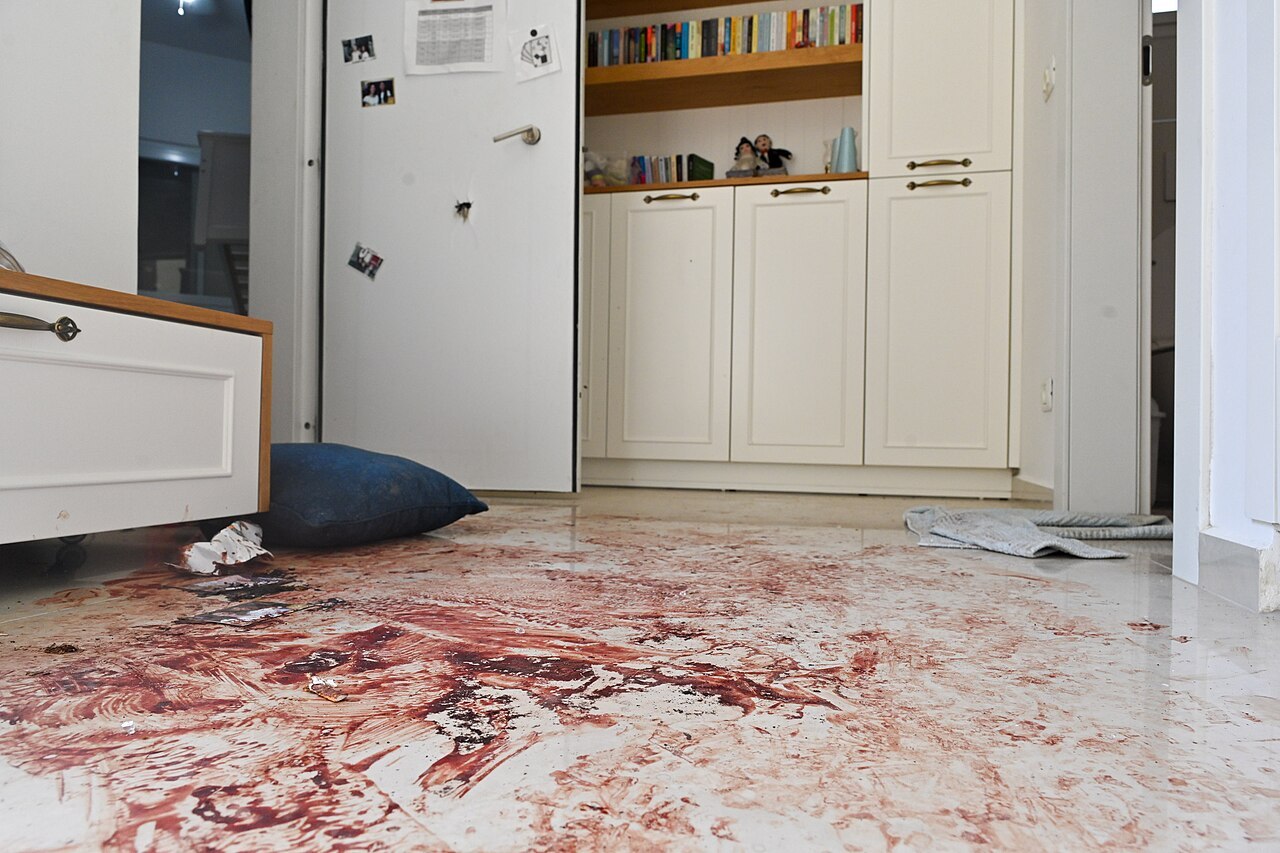 A blood-stained home floor in the aftermath of the Nahal Oz massacre in Nahal Oz, Israel.jpg