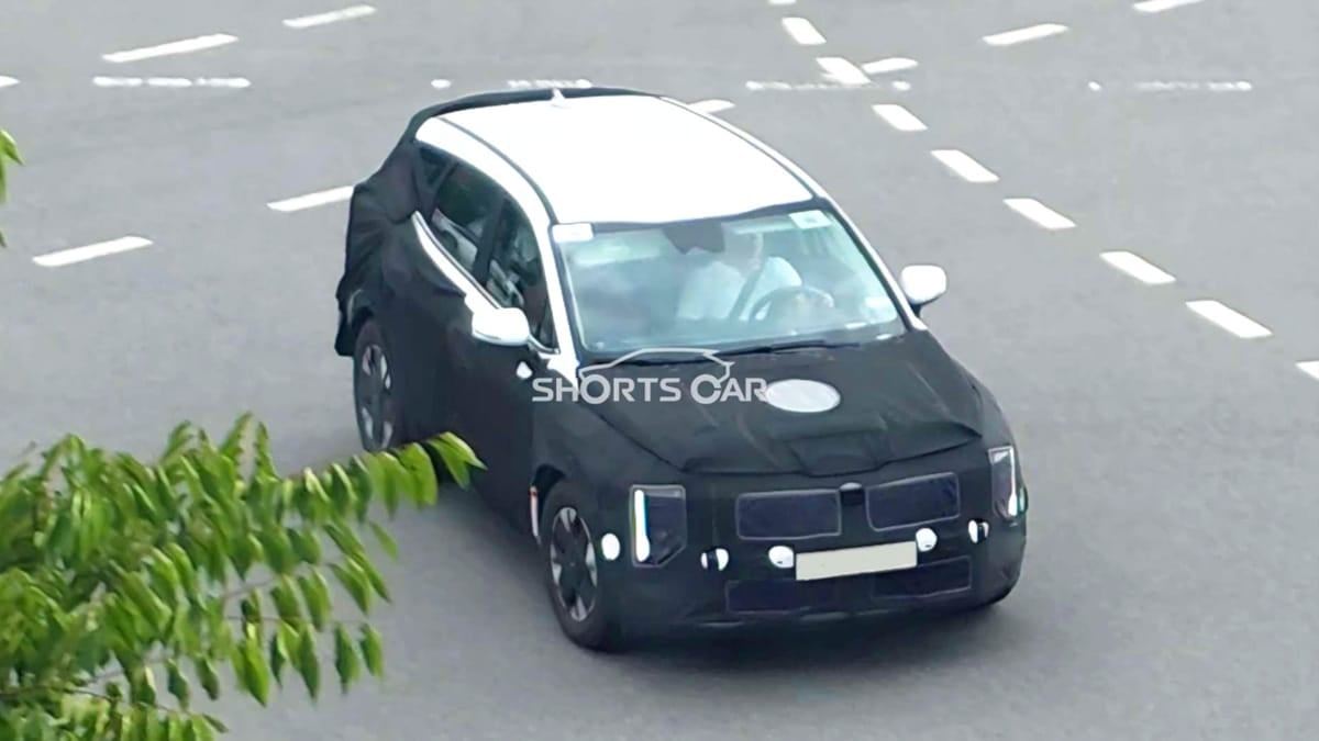 Kia-Sportage-mysteriously-spotted-in-camouflage-2.jpg