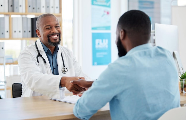 happy-doctor-patient-handshake-healthcare-checkup-consultation-agreement-hospital-black-man-medical-professional-shaking-hands-with-client-consulting-visit-appointment_590464-161153.jpg