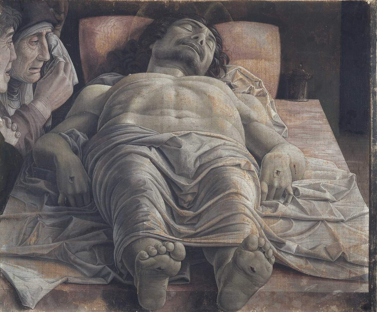 The_dead_Christ_and_three_mourners,_by_Andrea_Mantegna.jpg