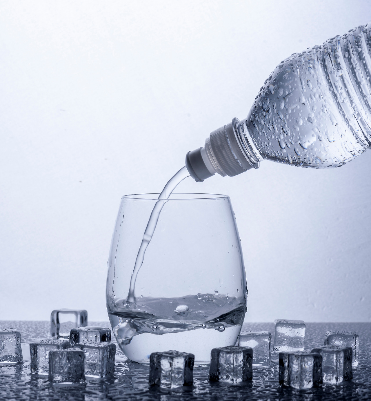 pouring-fresh-drinking-mineral-water-from-plastic-2025-02-10-10-44-25-utc.jpg