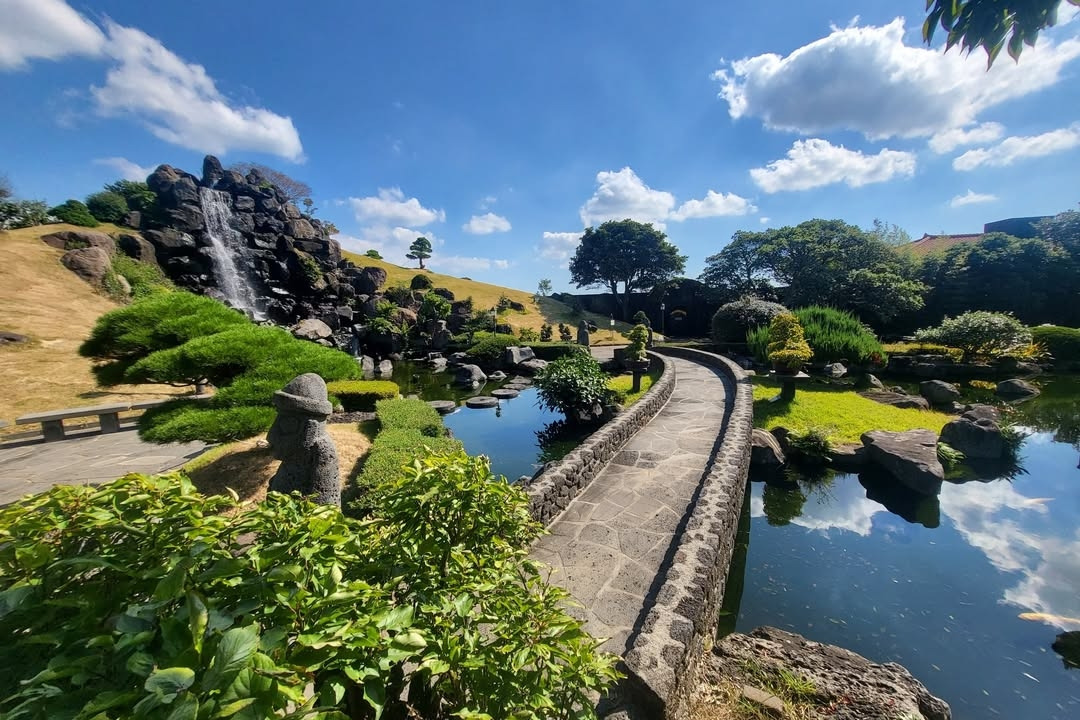 � A garden where stones, trees, and ponds hold stories shaped by time. Here, even the breeze li (4).jpg