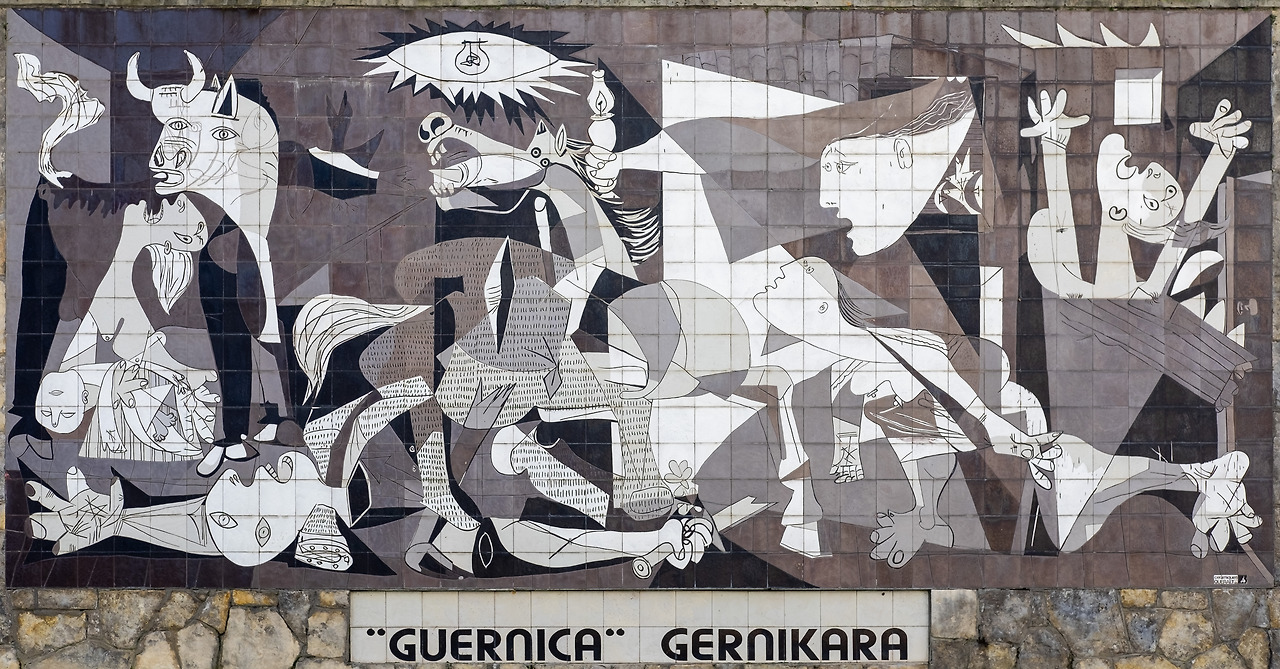 Guernica_reproduction_on_tiled_wall%2C_Guernica%2C_Spain_%28PPL3-Altered%29_julesvernex2.jpg