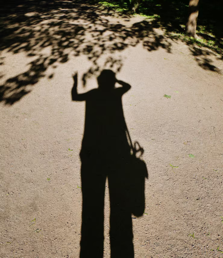 shadow-man-standing-road_1048944-21549642.jpg