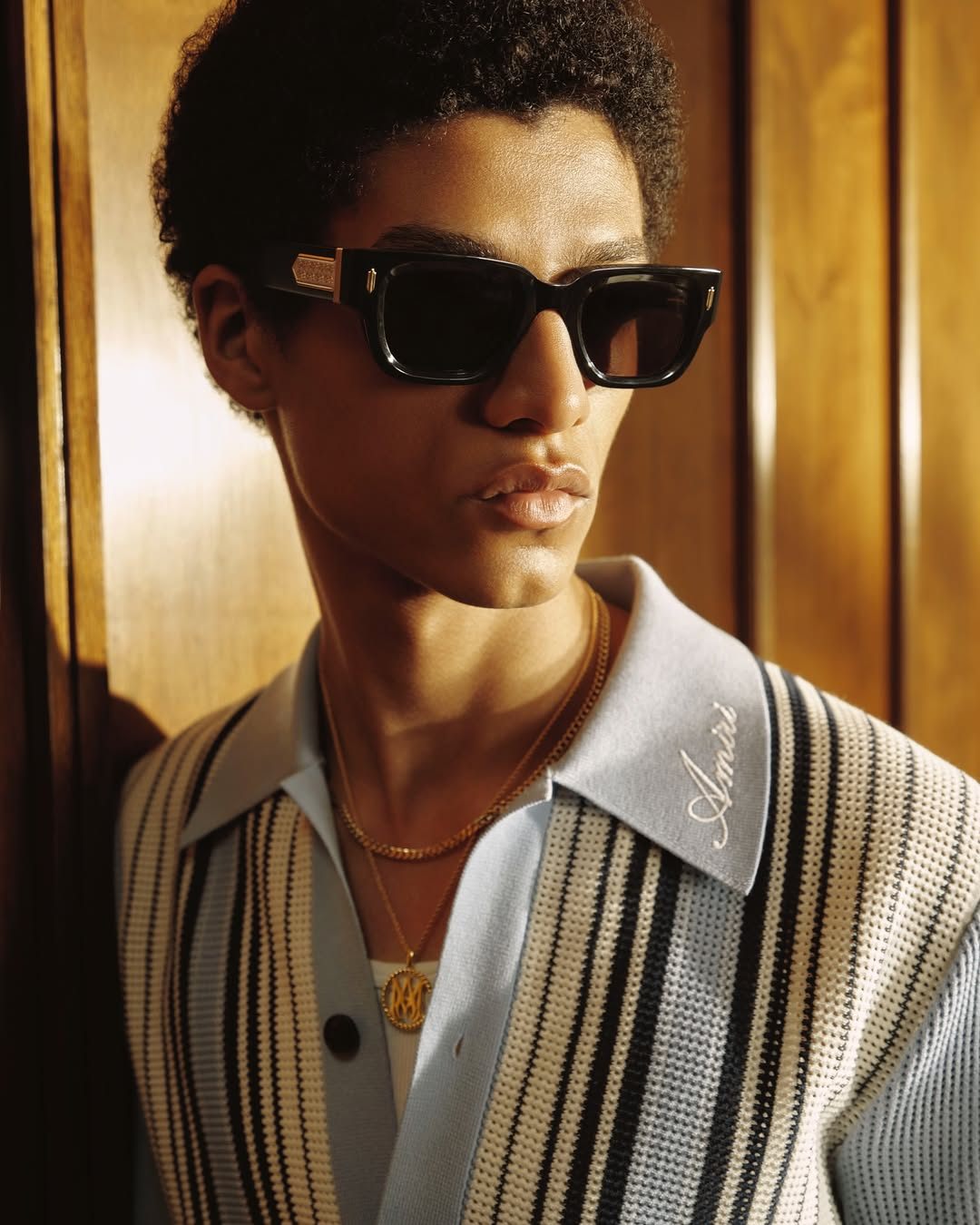 Across AMIRI’s new Eyewear silhouettes, subtle nods to mid-century modernism, vintage film stills, and the textures of Hollywood’s cultural past are captured through refined acetate frames, sculptural lines, and (1).jpg