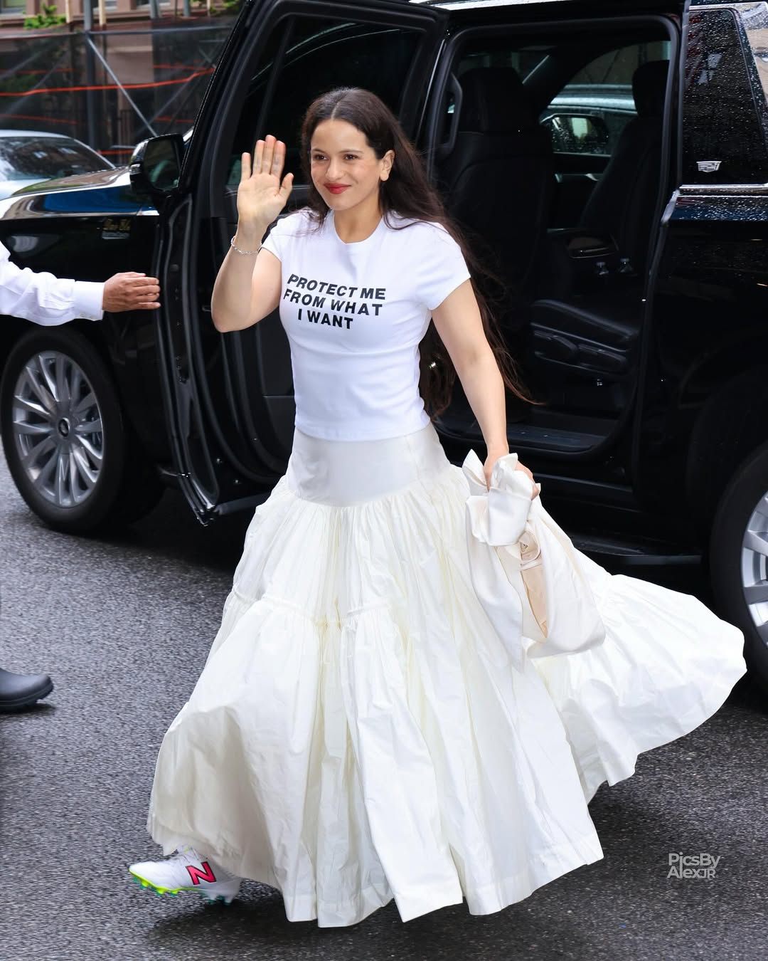 Rosalía makes a statement wearing a ‘Protect me from what I want” shirt while heading to a pre-Met Gala fitting in NYC  . #rosalia.jpg