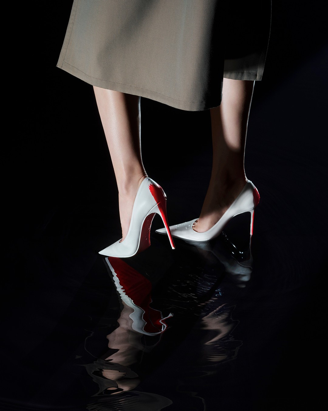 Crafted with precision, designed with intention. The Christian Louboutin x Maison Margiela twin capsule is a fusion of savoir-faire and creative mastery, where every detail tells a singular story.__#ChristianLoubout.jpg