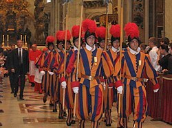 Group_of_swiss_guards_inside_saint_peter_dome.jpg