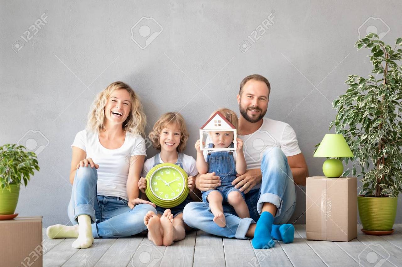 115561353-happy-family-with-two-kids-playing-into-new-home-father-mother-and-children-having-fun-together.jpg