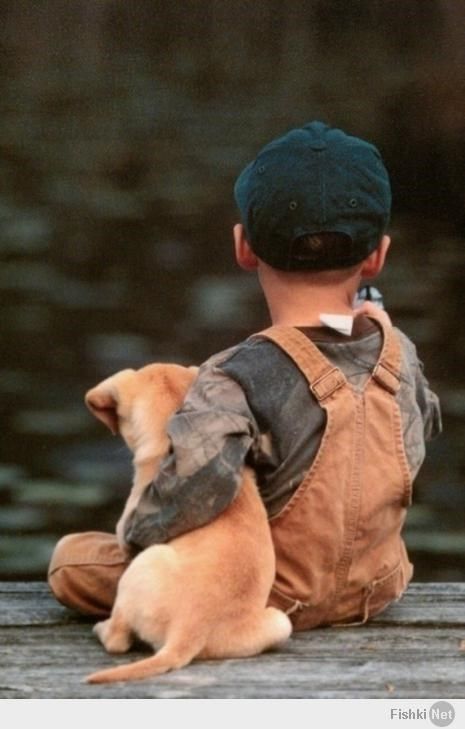 niño con su mascota.jpg