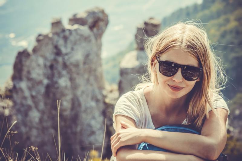 woman-traveller-hiking-in-the-mountains-494708765.jpg