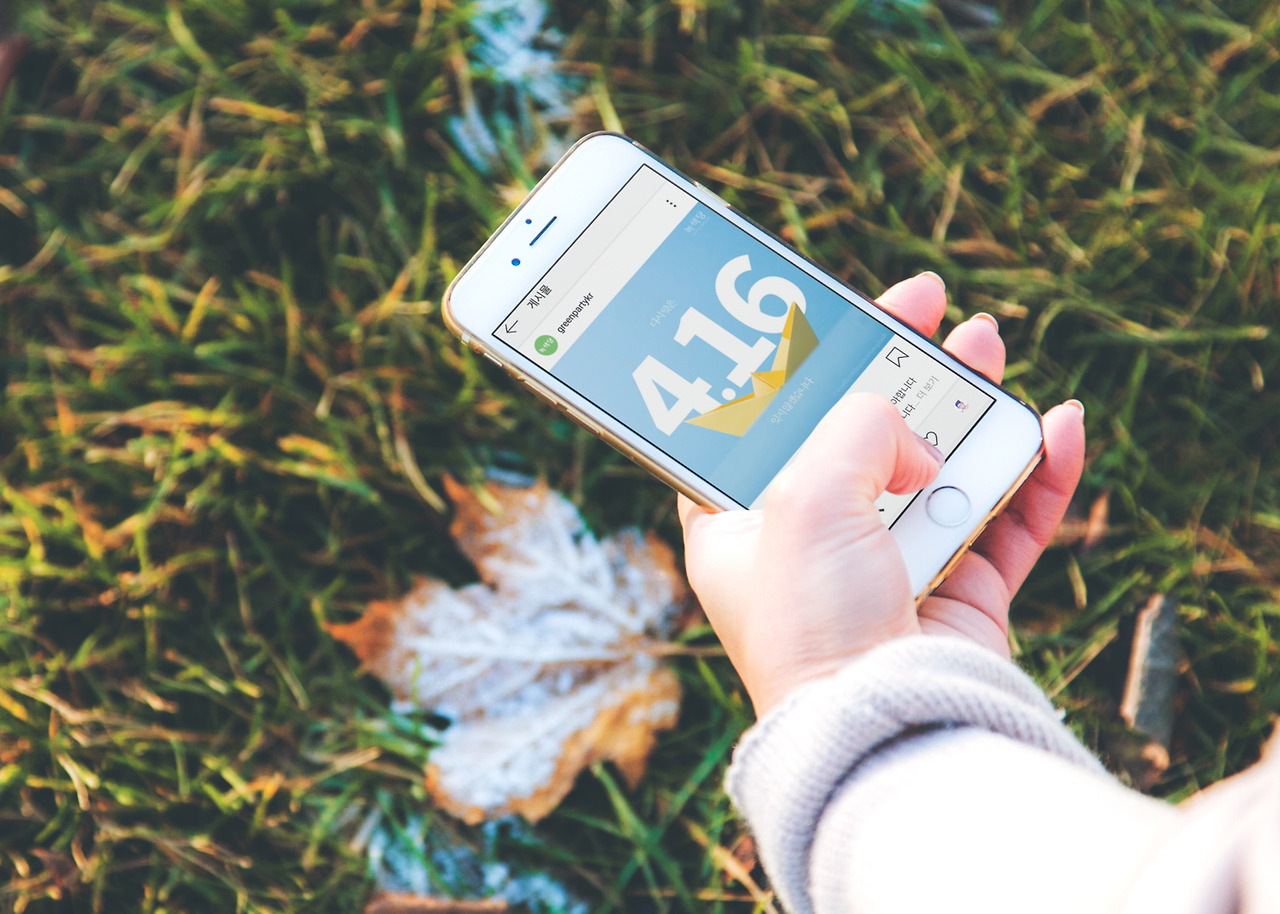 Woman holding iPhone.jpg