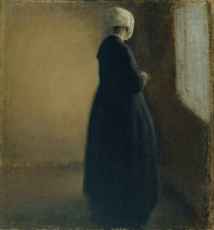 An old woman standing by a window (1885).jpg