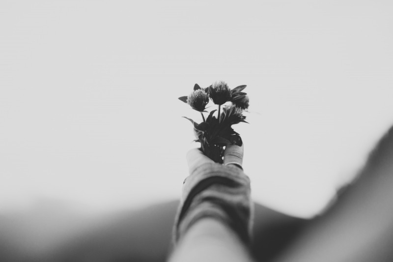 black-and-white-image-of-woman-holding-flowers.jpg