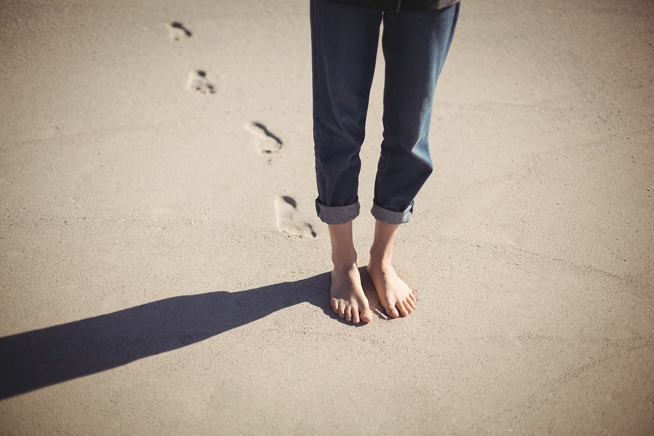 woman-walking-beach.jpg