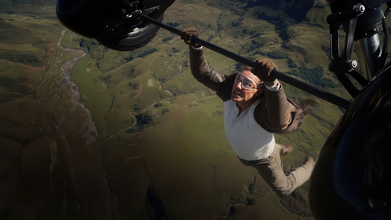 tom-cruise-hanging-on-plane-mission-impossible-the-final-reckoning-wf.jpg