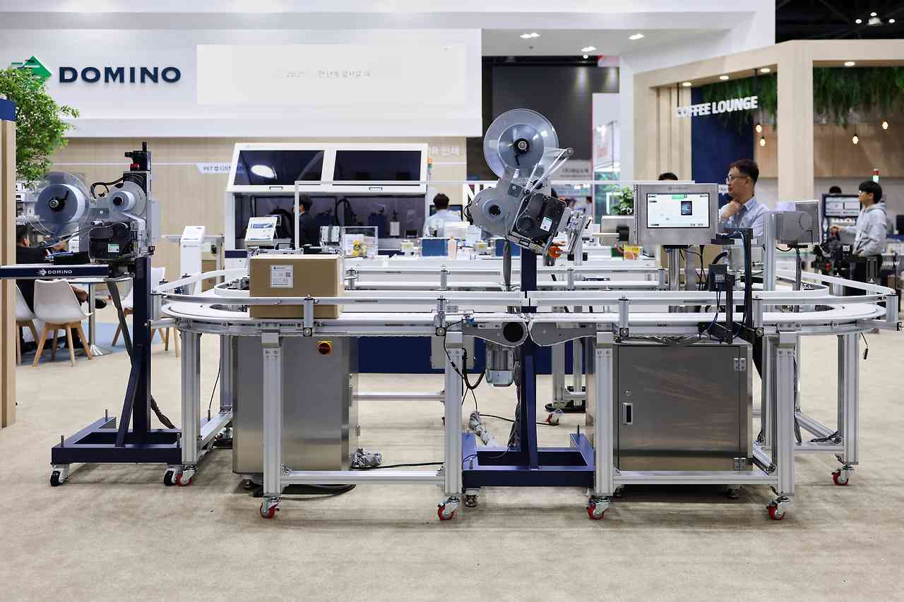 4. 2차 패키징 마킹 자동화 라인.jpg