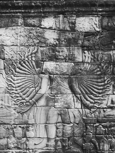 Bas-relief of a multi-armend Avalokitesvara ond the west side of the temple complex of Banteay C.jpg