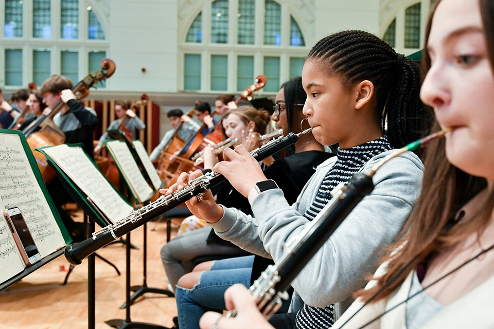 6x4 JD oboist in orchestral rehearsal.jpg